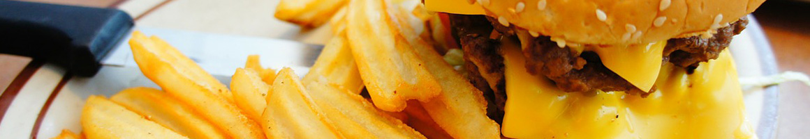 Eating Burger Hot Dog at Crazee Burger restaurant in San Diego, CA.